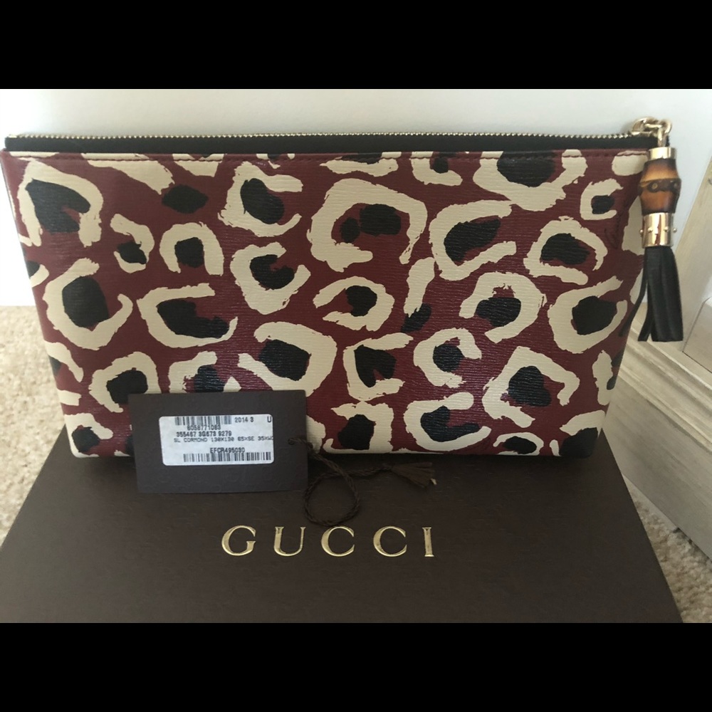 Gucci clutch with bamboo tassel